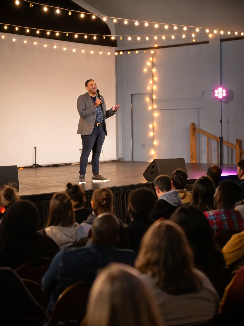 A public speaker delivering a presentation with confidence and ease, illustrating how the Alexander Technique can improve vocal projection and reduce performance anxiety.